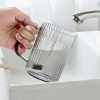 Household transparent mouthwash cup, simple tooth cup, toothache basin, washbasin cup, creative plastic water cup, strip-shaped couple toothbrush cup Specification image